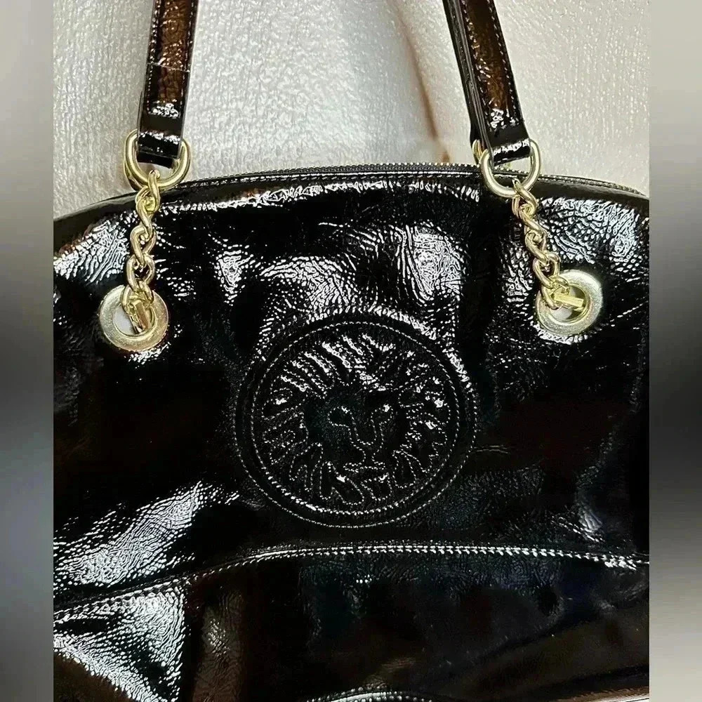 Anne Klein Patent Black Embossed Lion with Gold Accent Purse - Picture 2 of 10